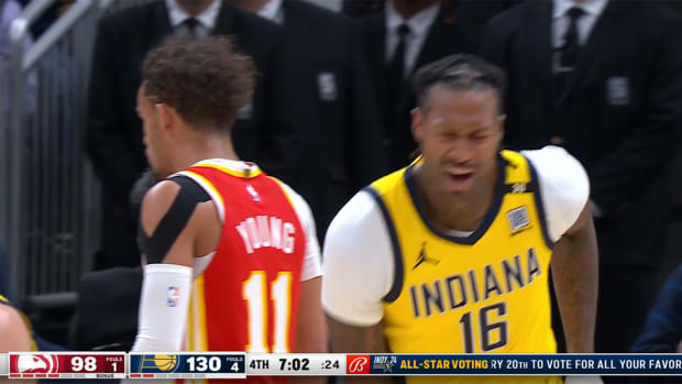 James Johnson reacts after a dunk against the Hawks.
